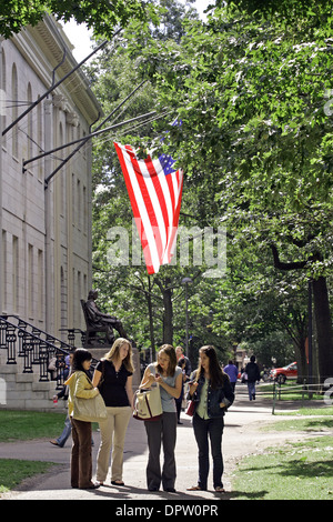 Students in the Harvard Yard Cambridge Ma. with John Harvard statue Stock Photo