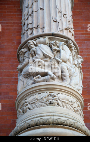 London, England, UK. Victoria and Albert Museum. Detail of carved stone column on the Lower Loggia overlooking Exhibition Road Stock Photo