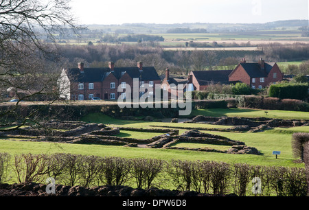 Roman ruins at Letocetum from St John’s Church Wall near Lichfield Staffordshire England with local housing behind Stock Photo