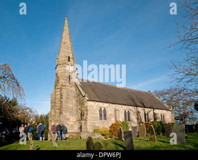 St John’s Church on Green Lane Wall near Lichfield Staffordshire England Group of men walkers in grounds Stock Photo