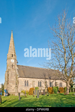 St John’s Church on Green Lane Wall near Lichfield Staffordshire England  Three men walkers in grounds Stock Photo