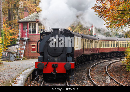 Steam train of the Lakeside and Haverthwaite Railway approaching Lakeside station at Windermere, Cumbria Stock Photo