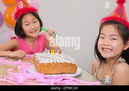 Cute little girls at a birthday party Stock Photo