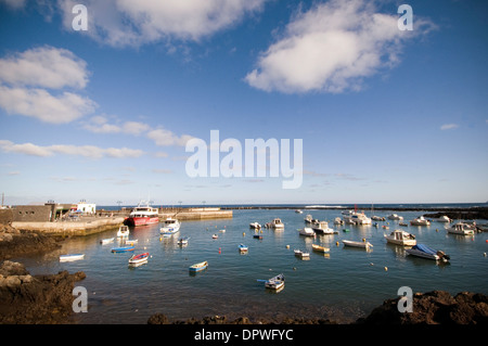 orzola lanzarote canary island islands canaries spain harbour harbor boat boats in Stock Photo