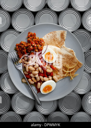 White bean red pepper salsa boiled egg flat bread Stock Photo