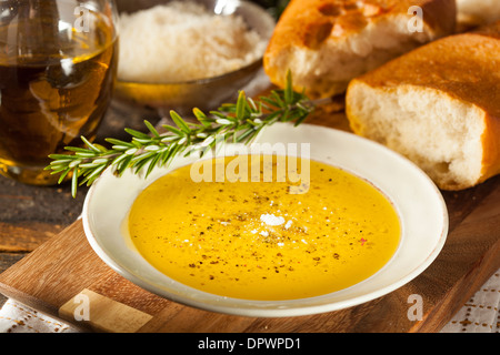 Italian Bread with Olive Oil for Dipping with Pepper and Cheese Stock Photo