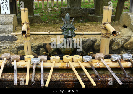 Hishakus, the Japanese traditional ladles made of bamboo or metal in the temple grounds of Todaiji, Nara, Japan. Stock Photo