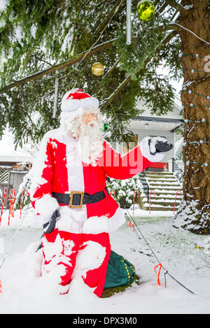 Santa Claus Christmas decoration with snow Stock Photo