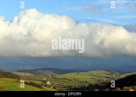 Aberystwyth, Wales, UK. 16th January 2014.  - The view of the Cambrian Mountains near Aberystwyth, Wales, UK. 16th January 2014.  clears leaving evening sunshine after heavy rain - 16 Jan 2014. Photo credit: John Gilbey/Alamy Live News Stock Photo