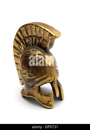 Souvenir ancient bronze greek helmet isolated on white Stock Photo