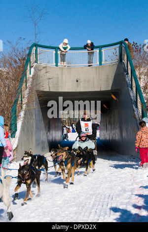 Mar 07, 2009 - Anchorage, Alaska, USA - Musher LAURA DAUGEREAU under bridge during 37th Iditarod Dogsled Race. (Credit Image: © Ron Levy/ZUMA Press) Stock Photo