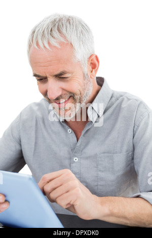Mature businessman using digital tablet Stock Photo