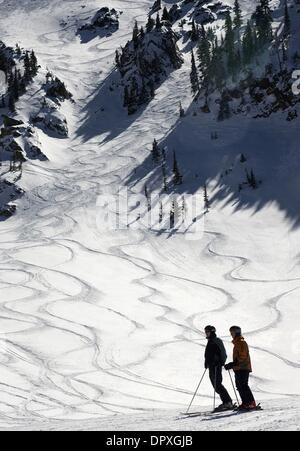 Mar 23, 2009 - Taos , New Mexico, U.S. - Ski tracks snake thru Main Street coming from 12,481 foot Kachina Peak. Skiers can access through a gate at the top of lift #2 and a hike along Highline Ridge. The ski area in Taos, New Mexico has installed a terrain park to accomodate the snowboarders which were new this season, along with two new Extreme runs and a green energy policy for  Stock Photo