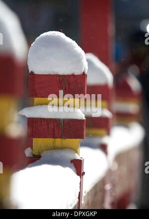 Mar 23, 2009 - Taos , New Mexico, U.S. - Snow piles on the fence posts at the entrance to the Ski Valley. The ski area in Taos, New Mexico has installed a terrain park to accomodate the snowboarders which were new this season, along with two new Extreme runs and a green energy policy for 2009. (Credit Image: Â© Ralph Lauer/ZUMApress.com) Stock Photo