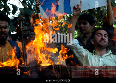 Apr 11, 2009 - New Delhi, India - Members of Jamia Teachers Solidarity Group shout slogans and burn the effigy of New Delhi Police against the shootout in which two terror suspects were killed on Sep 19, 2008, in front of Delhi Police Headquarters.  (Credit Image: © M Lakshman/M. Lakshman/ZUMA Press) Stock Photo