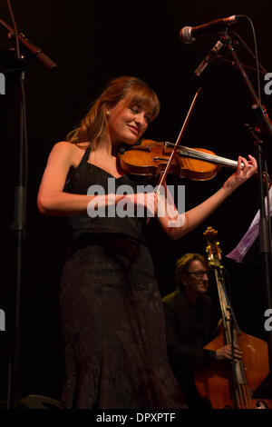 Glasgow, Scotland, UK. 16th January 2014. Nicola Benedetti,  Scottish classical violinist, performed with Aly Bain and  Phil Cunningham Celtic Connections Opening concert 2014.  She attended Yhudi Menuhin school of music, BBC Young Musician of the Year 2004.  Performed with the Scottish National Orchestra, Royal Philharmonic orchestra, the Proms, London Symphony Orchestra, Credit:  Pauline Keightley/Alamy Live News Stock Photo