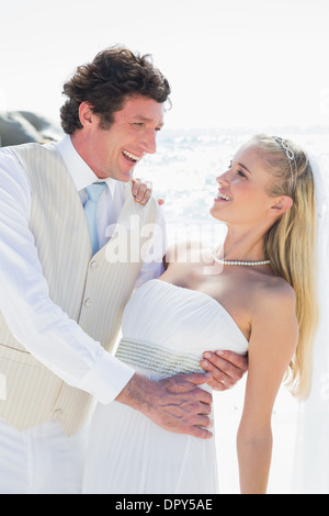 Groom dipping his smiling new wife while dancing Stock Photo