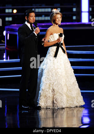 Jan 24, 2009 - Las Vegas, Nevada, USA - Host MARIO LOPEZ (L) along side the 2008 Miss America, KIRSTEN HAGLUND (R) onstage for the 2009 Miss America contestants open the show that was televised live on TLC from Planet Hollywood Hotel and Casino. (Credit Image: © Valerie Nerres/ZUMA Press) Stock Photo