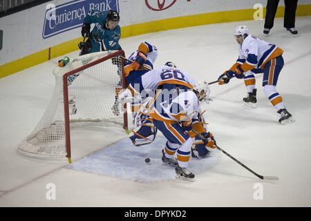 San Jose, California, USA. 10th Dec, 2013. Tomas Hertl (48) shoots a puck from behind the Islander's net © Jeff Cable/ZUMAPRESS.com/Alamy Live News Stock Photo