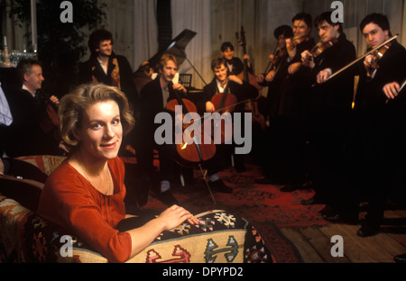 Juliet Stevenson British actress on film set of Truly Madly Deeply.  March Alan Rickman British actor playing cello. London, England 1990 1990s HOMER SYKES. Stock Photo