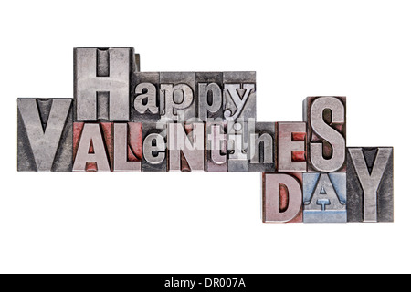 Happy Valentines Day text in old metal letterpress blocks with mixed font, isolated on a white background. Stock Photo