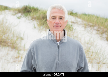 Portrait of a handsome senior man at beach Stock Photo