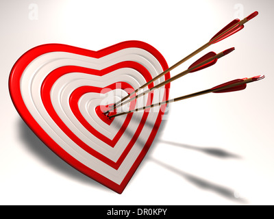 Heart shaped target with arrows in it. Stock Photo