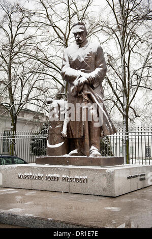 Marshal Pilsudski statue in snow in Warsaw Stock Photo