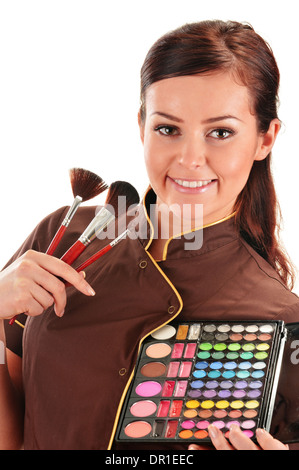 Professional beautician holding brushes Stock Photo