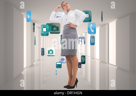 Composite image of focused businesswoman Stock Photo
