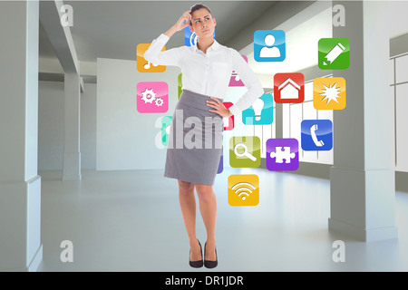 Composite image of focused businesswoman Stock Photo