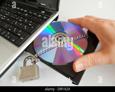 CD ROM in the CD drive of a labtop computer Stock Photo