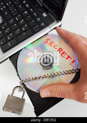 CD ROM in the CD drive of a labtop computer Stock Photo
