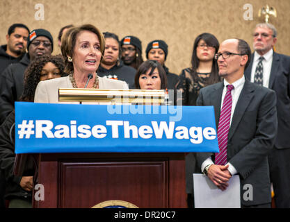 Washington DC, USA. 15th Jan, 2014. US House Democrat Leader Nancy Pelosi along with House Democratic Members hold a press conference on the need to raise the federal minimum wage January 15, 2014 in Washington, DC. Democrats are calling for a lifting of the minimum wage to $10.10 per hour from the current $8.25. Credit:  Planetpix/Alamy Live News Stock Photo