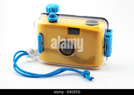 yellow camera in waterproof box over white Stock Photo