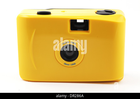 yellow camera shoot and go over white Stock Photo