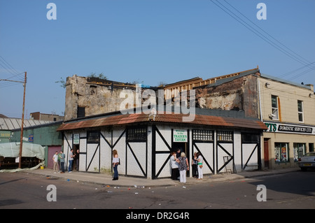 Local bar called the Traders Tavern in the Barrowlands in Glasgow, Scotland, UK. The to floor has been demolished, Stock Photo