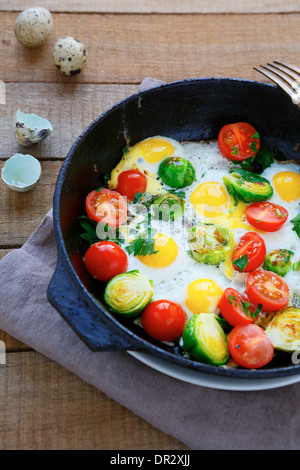 healthy and nutritious breakfast - fried eggs with vegetables, food Stock Photo