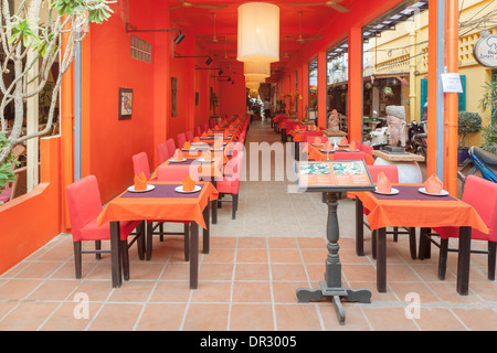 Colouful restaurant interior with Buddha images in Siem Reap, Cambodia Stock Photo