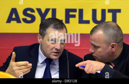 Kirchheim, Germany. 18th Jan, 2014. Temporary federal chairman of the NPD Udo Pastoers (L) talks to NPD state party chairman of Thuringia Patrick Wieschke (R) at the federal party conference of the right-wing extremist National Democratic Party of Germany (NPD) in Kirchheim, Germany, 18 January 2014. Photo: JENS-ULRICH KOCH/dpa/Alamy Live News Stock Photo