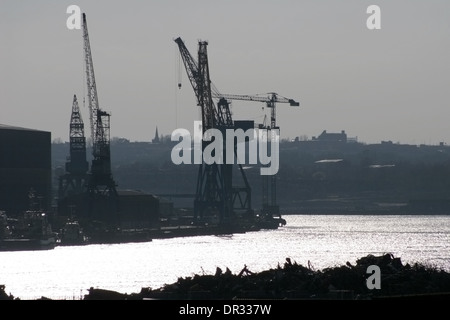 View towards historic ship building cranes on the banks of the river Tyne Stock Photo