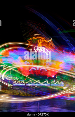 Dynamic light traces of an carousel Stock Photo