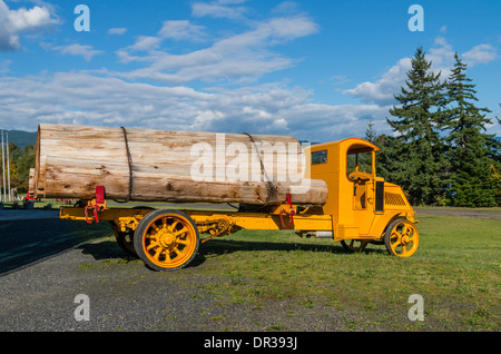 Vintage log truck with large log at the Columbia Gorge Interpretive Center Museum. Stevenson, Washington Stock Photo