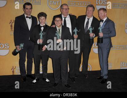 Los Angeles, CA, USA. 18th Jan, 2014. Cast of MODERN FAMILY, Ty Burrell, Nolan Gould, Rico Rodriguez, Ed O'Neill, Eric Stonestreet, Jesse Tyler Ferguson in the press room for The 20th Annual Screen Actors Guild Awards (SAGs) - Press Room, The Shrine Auditorium, Los Angeles, CA January 18, 2014. Credit:  Elizabeth Goodenough/Everett Collection/Alamy Live News Stock Photo