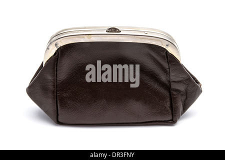 A brown, vintage coin purse with a silver clasp sits on a white backdrop. Stock Photo