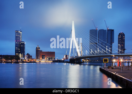 City of Rotterdam downtown skyline by the river at night in South Holland, the Netherlands. Stock Photo