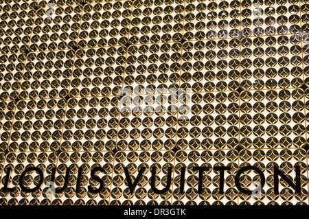 Exterior of the Louis Vuitton high-fashion store in the historic centre of  Florence with an old lady passing by bike, Tuscany, Italy Stock Photo -  Alamy