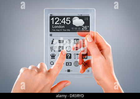 Tablet with a transparent display in human hands. Concept actual future innovative ideas and best technologies humanity. Stock Photo