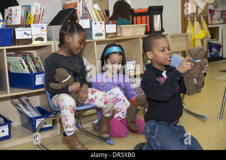 Active elementary school class at the Castle Bridge public elementary school in upper Manhattan, NYC. Stock Photo