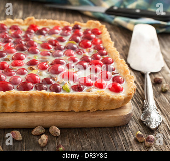 White chocolate tart  with pistachio and cranberry Stock Photo